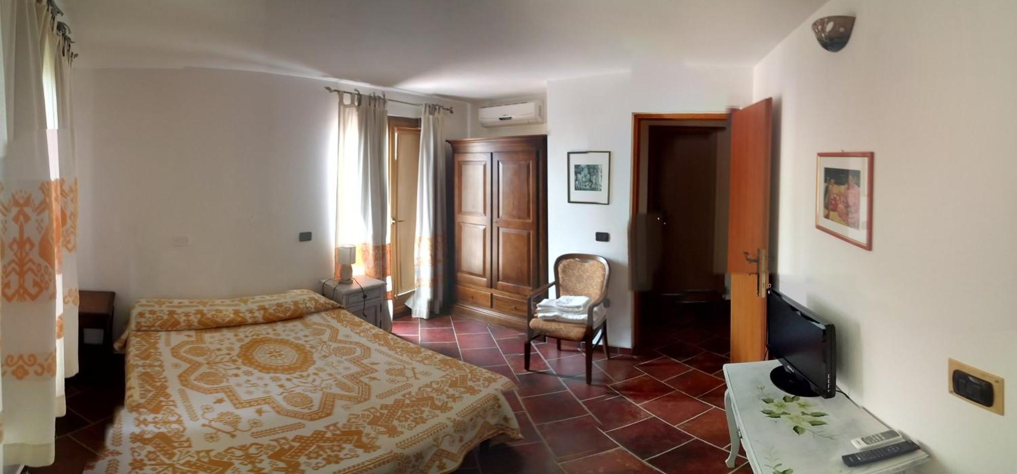 Locanda Tipica Sa Corte Ольена Номер фото